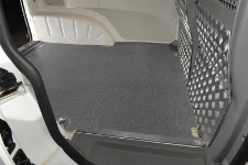 A marble-look plywood floor liner and aluminium tread plate bulkhead liners