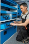 A metal case on an open shelf