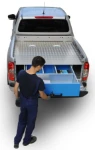 A pickup with slide-out storage