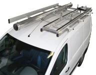 A pivoting ladder slide and a pipe carrier on the roof of a Toyota ProAce