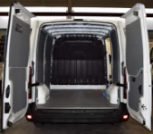 A plywood floor liner and aluminium bodywork liners in an NV400