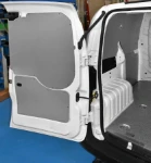 A plywood floor liner and bodywork lining panels in a Fiat Fiorino
