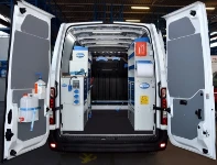 A Renault Master with a racking system for servicing compressors
