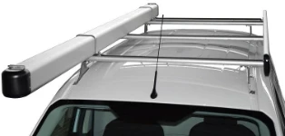 A roof rack with a pipe carrier on a Courier
