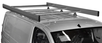 A roof rack with rear roller and side fences on a ProAce