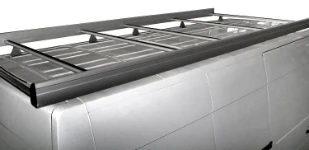 A roof rack with rear roller and side fences on an NV400