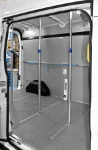 A Sprinter with interior lining and cargo bars