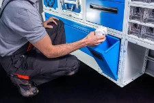 A Syncro racking system with a removable bin