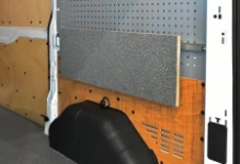 A Syncro System fold-away table in closed position