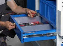 A Syncro Ultra drawer with a recessed release button and internal space dividers