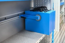 A tool case held on the shelf by the shuttle with buffer pad