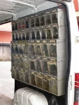 A traditional column drawer unit with transparent drawers fitted in the van