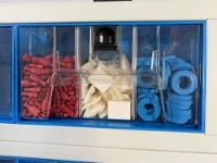 A transparent drawer divided into three compartments