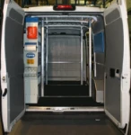A van fitted out to carry and install doors and windows