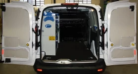 A van with a Syncro upfit for structured cabling technicians