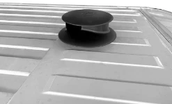 A wind-driven extractor on the roof of a van