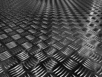 An aluminium tread plate floor liner