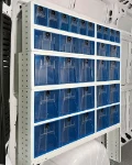 An example of a van set-up with rows of transparent tilting drawers