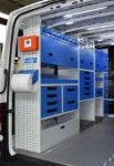 An extensive racking system on the left of the MAN TGE