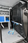 Bulkhead of the Ford Courier with rail and strap