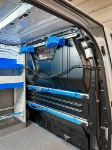 Bulkhead of the Volkswagen Transporter with aluminium rails, straps and cable saddles