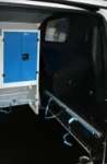 Cargo lashing accessories in a van operated by industrial door installers