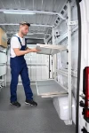 Cargo strapped to closed fold-way shelves