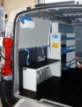 Lato sinistro Opel Movano con pianale, pannellatura, copriruota, ganci e rotaia per cinghie