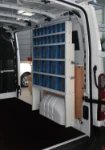 Clear containers in a van upfit for door and gate installers