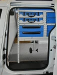 Dokker shelving with cases, drawers and vice from the side door