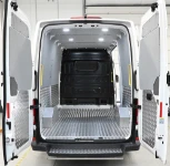 Empty cargo area of the MAN TGE with anti-slip aluminium wall and floor lining