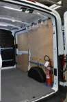 Rivestimento lato sinistro del Dokker con copriruota in alluminio mandorlato