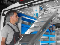 Inserting the ladder onto the ladder rack