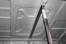 Insertion of load lock pole to ceiling track