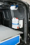 Jerry can with dispenser tap for soap and paper roll holder in the Courier