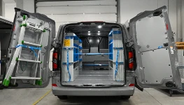 Ladder hooks on the door and shelving in the Transporter