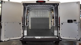 Non-slip floor and bulkhead liners in marble-look plywood and interior liners for the Ducato