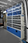 Pull-out and tilting transparent containers for vans