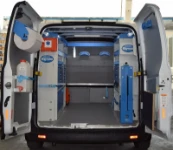 Racking for a cogeneration engine service in a Ford Custom