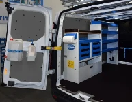 Racking for a wireless network technician on the left of the Custom