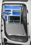 Resin-coated marine plywood floor panel, cable saddle and shelving for the Combo
