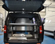 01_The van’s interior, showing the coffin slide and raised floor