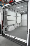 02_Shelves folded away on the left of a van