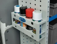 04_A spray can rack with round holes