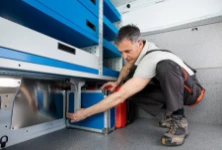 10_A floor-level case compartment in a van