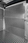 A bulkhead liner in aluminium chequer plate