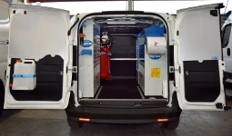 A Fiat Doblò with racking for servicing farm machinery