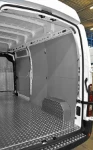 A plywood floor liner and steel bodywork liners in the Movano