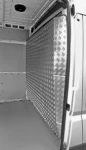 A side view of the shaped bulkhead liner in aluminium chequer plate for the Ducato /Jumper /Boxer