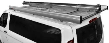 A steel pipe carrier on a Custom’s roof rack